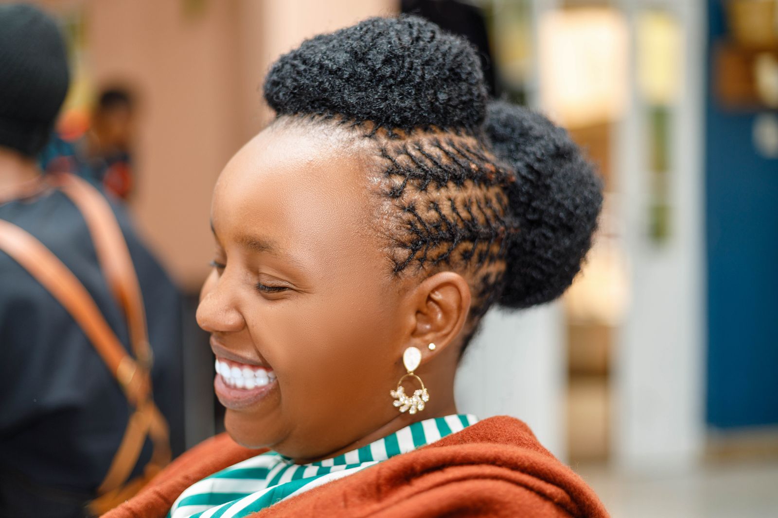 Happy client showing off sisterlocs updo